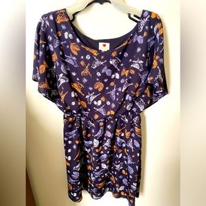 Blue, orange, and white dress.